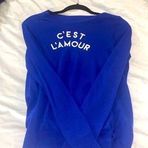 This is love sweater Merino wool from Banana Republic size small in Royal blue